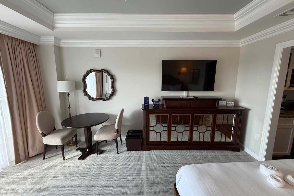 Table & two chairs, TV, twin Murphy bed